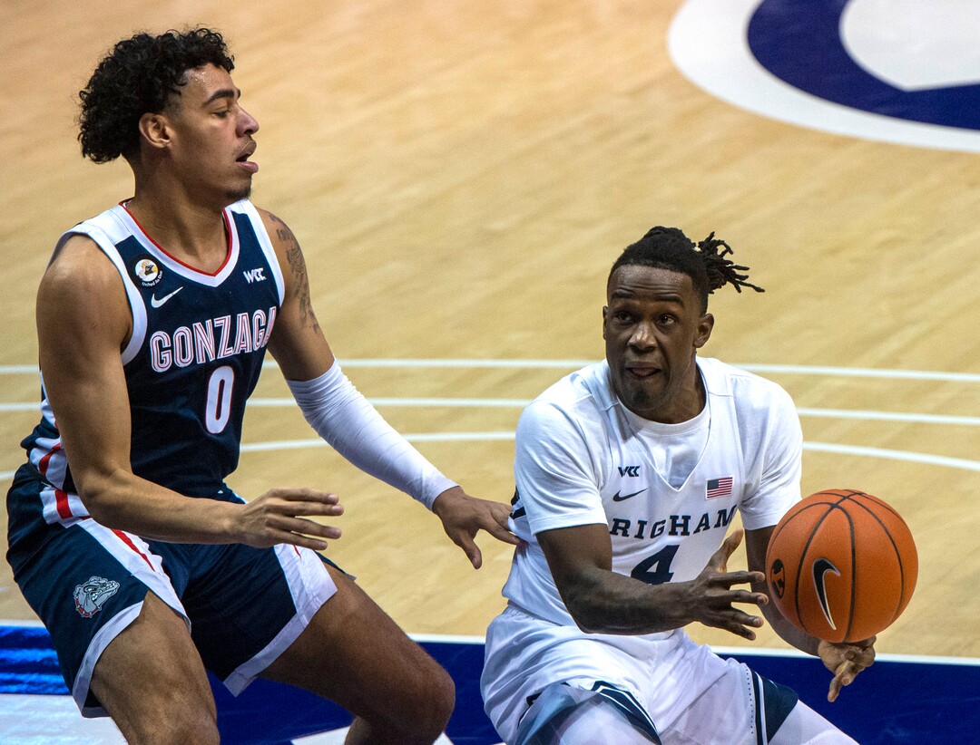 (Rick Egan | The Salt Lake Tribune)  Gonzaga Bulldogs guard Julian Strawther (0) guard's Brigham Young Cougars guard Brandon Averette (4), in West Coast Conference Basketball action between the Brigham Young Cougars and the Gonzaga Bulldogs at the Marriott Center in Provo, on Monday, Feb. 8, 2021.