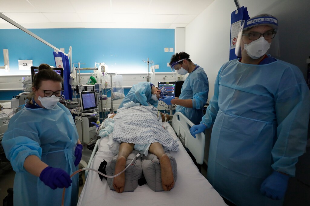 (Kirsty Wigglesworth | AP photo)

In this Jan. 27 photo, Critical Care staff look after a COVID-19 patient on the Christine Brown ward at King's College Hospital in London.