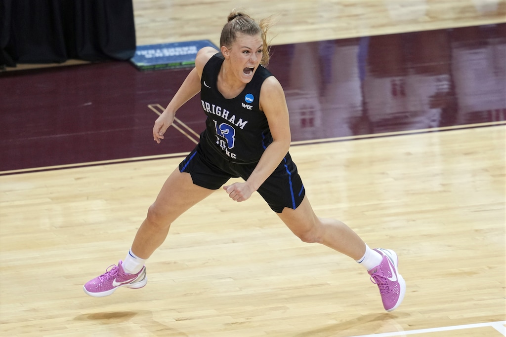 (Chuck Burton | AP) BYU's Paisley Harding (13) celebrates after BYU defeated Rutgers in a college basketball game in the first round of the women's NCAA tournament at the University Events Center in San Marcos, Texas, Monday, March 22, 2021. BYU defeated Rutgers 69-66.