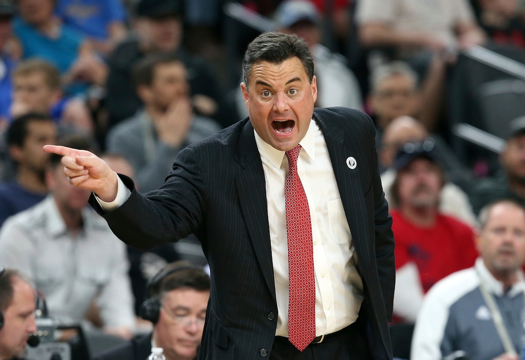 Arizona coach Sean Miller gestures during the first half of the team's NCAA college basketball game against UCLA in the semifinals of the Pac-12 men's tournament Friday, March 9, 2018, in Las Vegas. Arizona won 78-67 in overtime. (AP Photo/Isaac Brekken)