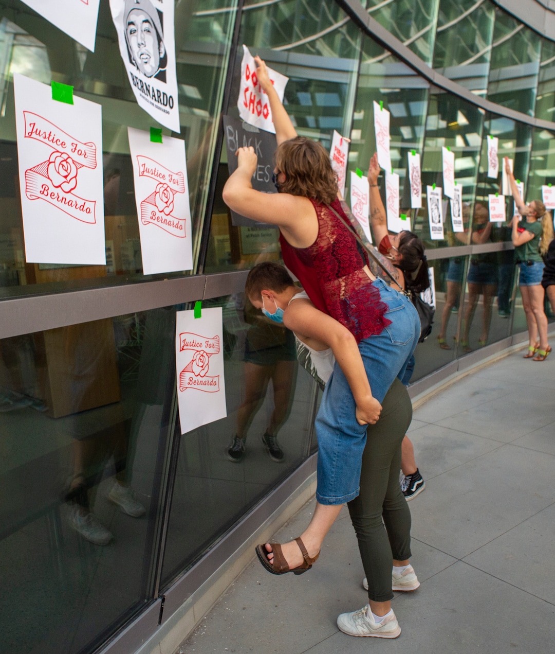 (Rick Egan  |  The Salt Lake Tribune)    Protesters take their signs to the Salt Lake Public Safety Building, during a Justice for Bernardo protest on Wednesday, June 24, 2020.