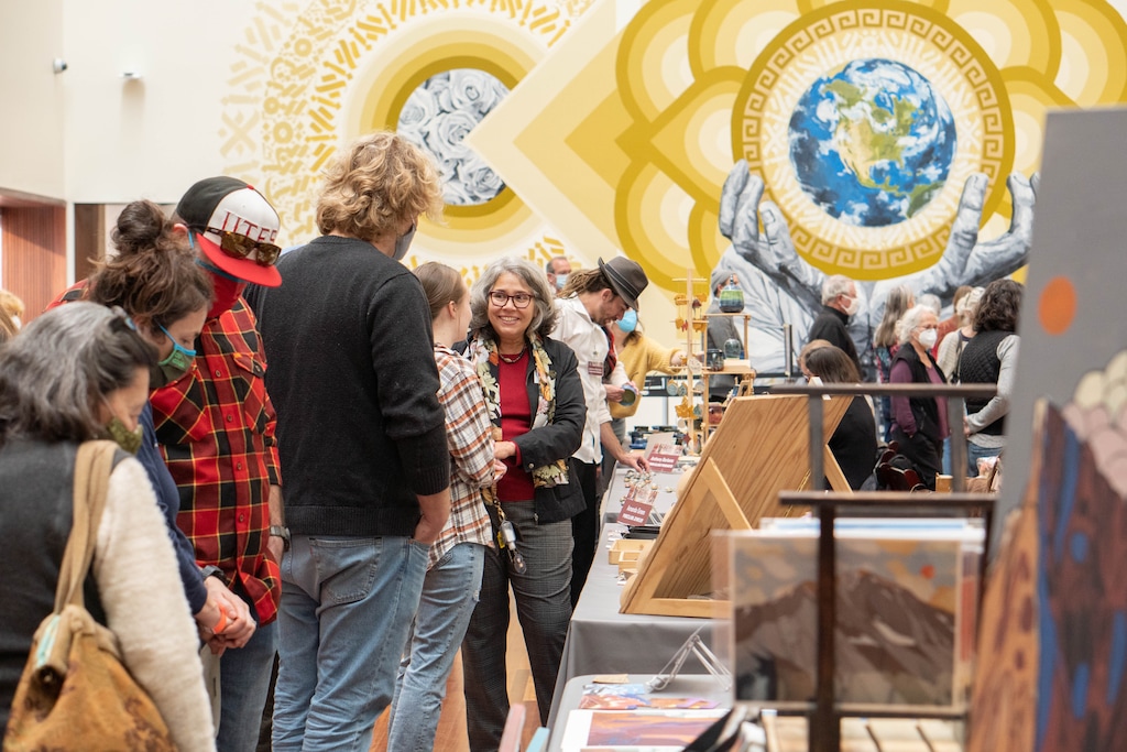 (Utah Museum of Fine Arts) Shoppers look over artists' work for sale at the Utah Museum of Fine Arts' Holiday Market in 2021. This year's market, set for Dec. 3-4, 2022, is one of several such events across Utah this season.