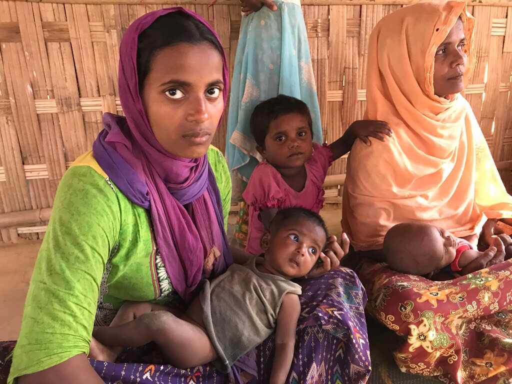 Photo by Holly Richardson | Women and children live in a refugee camp in Bangladesh, fleeing from persecution and death in Myanmar.