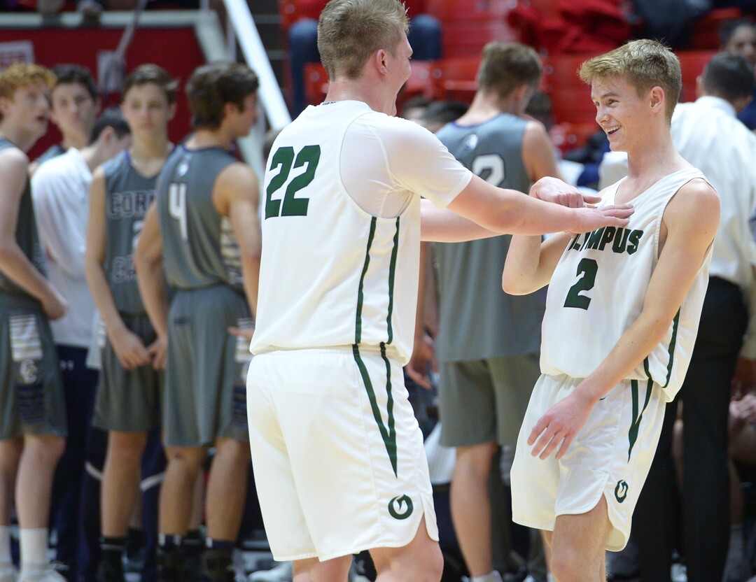 (Leah Hogsten  |  The Salt Lake Tribune) Olympus' Spencer Jones (22) pushes Olympus' Jacob DowDell (02) in the remaining minutes of the game. Olympus defeated Corner Canyon 76-49 to win the 5A High School BoysÕ Basketball Tournament Championship at the Jon M. Huntsman Center in Salt Lake City,  Saturday, March 3, 2018. 