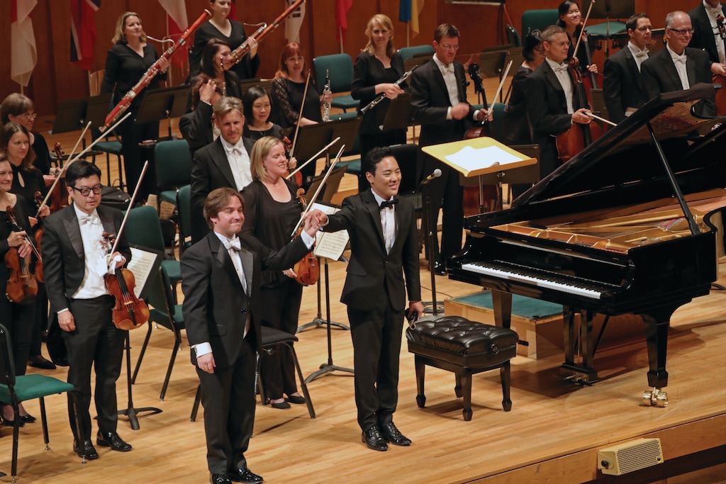 (Photo courtesy of Gina Bachauer International Piano Foundation) Changyong Shin, 24, of South Korea, acknowledges applause after performing with the Utah Symphony and conductor Conner Gray Covington in the final round of the Gina Bachauer International Artists Piano Competition in Abravanel Hall on Friday, June 22, 2018.
