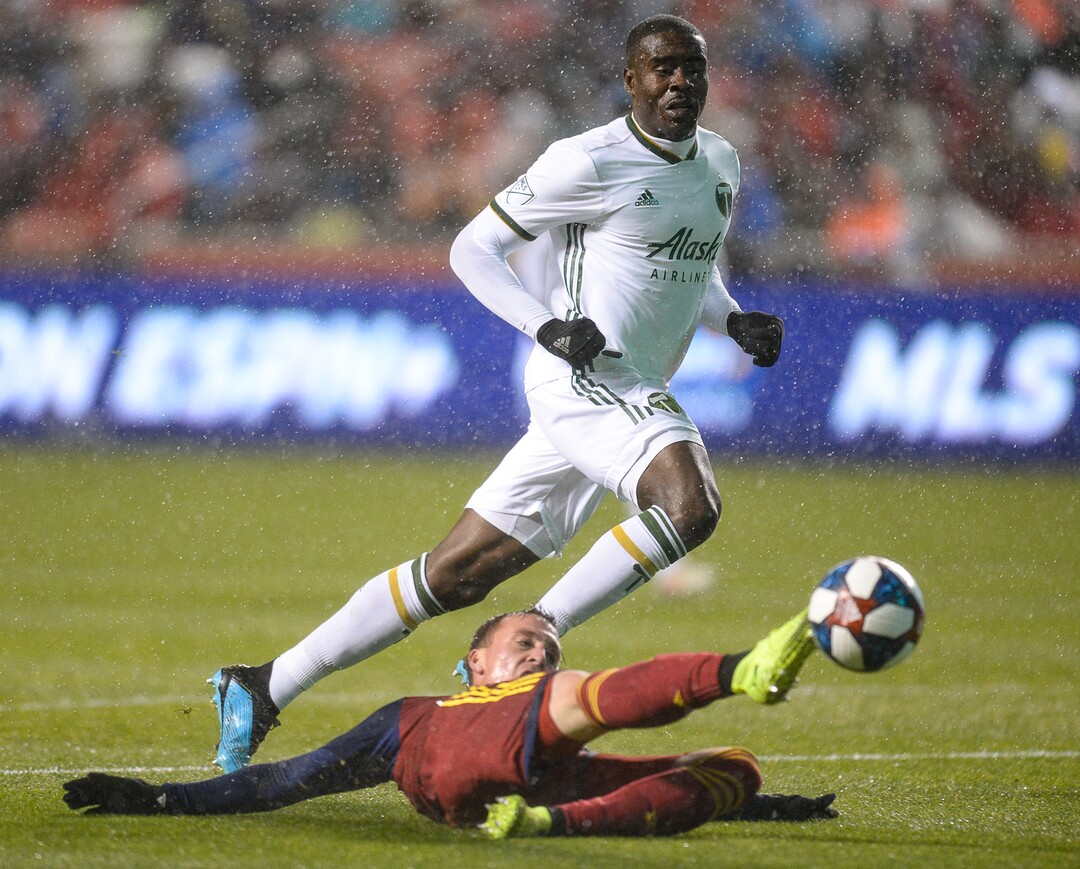 (Francisco Kjolseth  |  The Salt Lake Tribune)  Real Salt Lake forward Corey Baird (17) reaches out for the ball as Portland Timbers defender Larrys Mabiala (33) stays close as Real Salt Lake and the Portland Timbers play in their first MLS playoff game at Rio Tinto Stadium in Sandy, Utah on Saturday, Oct. 19, 2019.