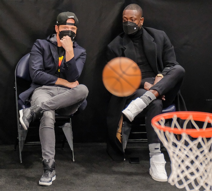(Leah Hogsten | The Salt Lake Tribune) Utah Jazz majority owner and Qualtrics founder Ryan Smith and former Miami Heat guard and new Jazz minority owner Dwyane Wade talk as the Utah Jazz host the Indiana Pacers, Friday, April 16, 2021, at Vivint Arena.