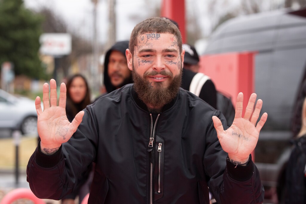 (Rick Egan | The Salt Lake Tribune) Rapper-singer Post Malone, seen here opening a Raising Cane's he designed in Midvale in 2023, is going on tour in fall 2024 — with the first show in Utah.