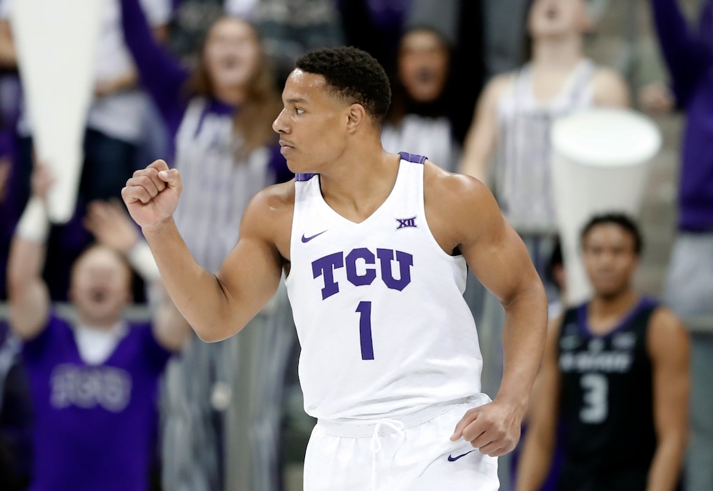 TCU guard Desmond Bane (1) celebrates sinking a three-point basket in the first half of an NCAA college basketball game against Kansas State in Fort Worth, Texas, Monday, March 4, 2019. (AP Photo/Tony Gutierrez)
