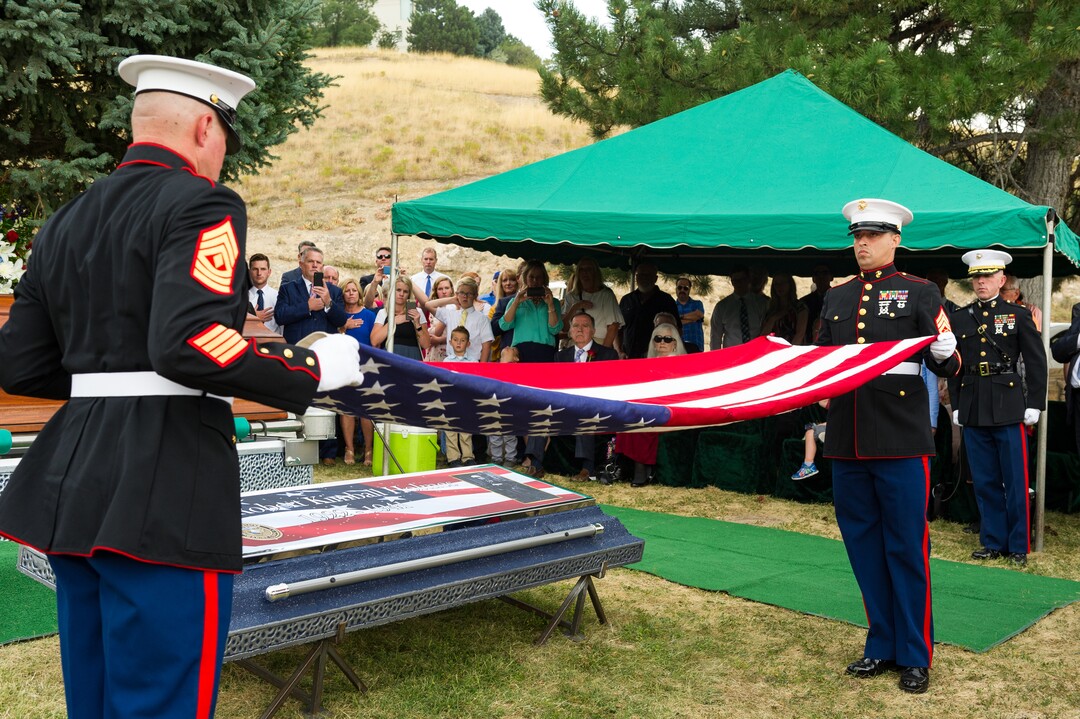 (Alex Gallivan  |  Special to The Tribune) Marine Pfc. Robert K. Holmes, who died 77 years ago aboard the USS Oklahoma during the attack on Pearl Harbor, is laid to rest in the Salt Lake City Cemetery, Monday, Aug. 20, 2018.