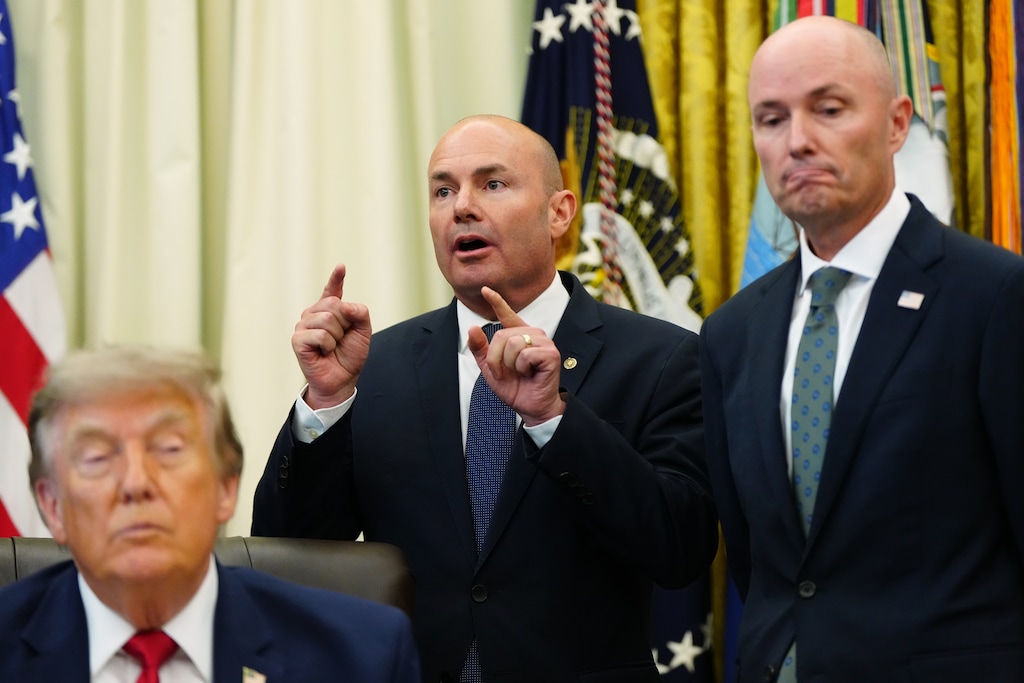 (Julia Demaree Nikhinson | AP) President Donald Trump and Utah Gov. Spencer Cox listen as Sen. Mike Lee, R-Utah, speaks in the Oval Office of the White House, Monday, July 13, 2026, in Washington.