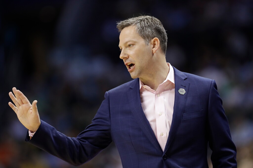 (Gerry Broome | AP) UMBC head coach Ryan Odom directs his team against Kansas State during the first half of a second-round game in the NCAA men's college basketball tournament in Charlotte, N.C., Sunday, March 18, 2018. Odom has been hired as the new baksetball coach at Utah State, replacing Craig Smith.