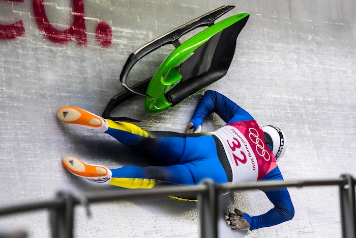 (Chris Detrick  |  The Salt Lake Tribune)  Ukraine's Andriy Mandziy falls off of his sled while competing in the Men's Singles at the Olympic Sliding Centre during the Pyeongchang 2018 Winter Olympics Saturday, February 10, 2018.  Mandziy finished this run in last place with a time of 1:02.935.