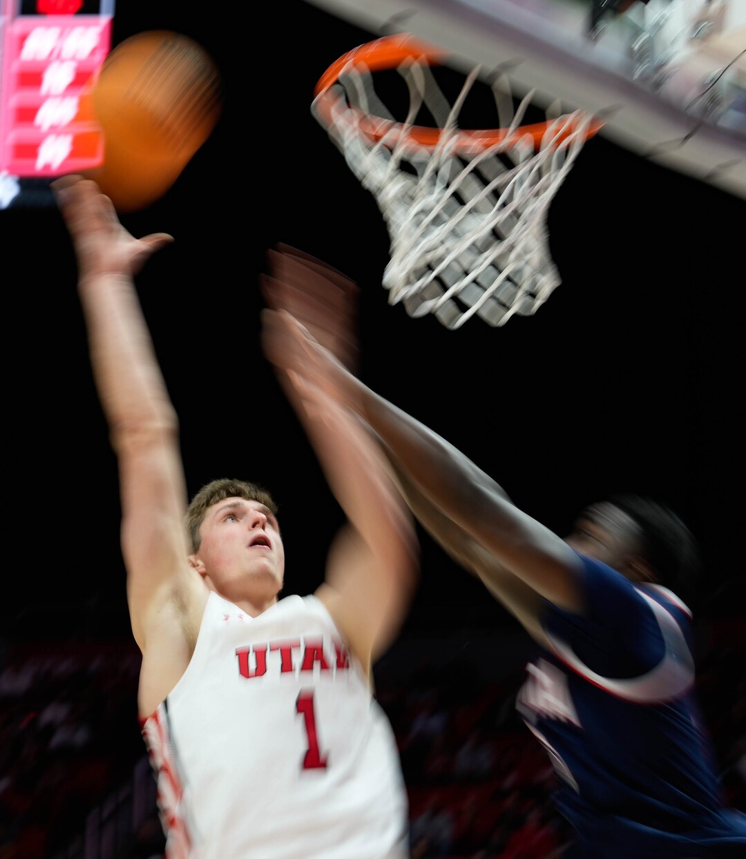 (Francisco Kjolseth | The Salt Lake Tribune) Utah Utes forward Ben Carlson (1) gets the point as the University of Utah hosts the Arizona Wildcats in NCAA basketball in Salt Lake City on Thursday, Dec. 1, 2022.