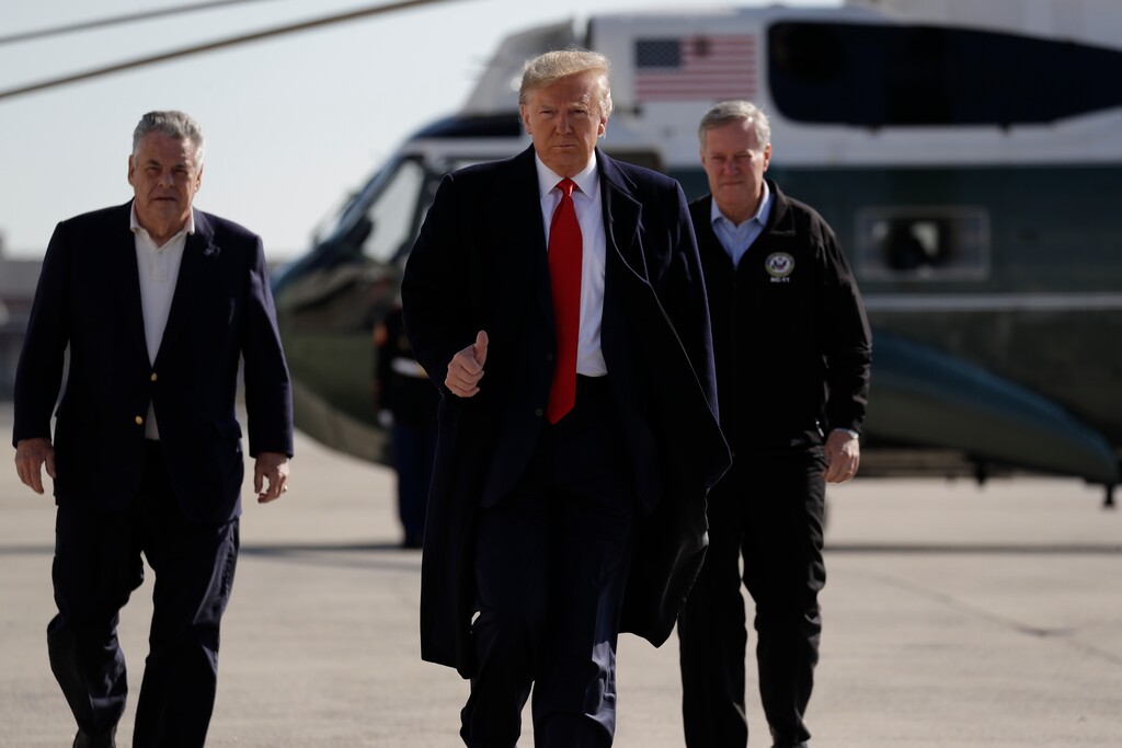 (Evan Vucci | AP) President Donald Trump boards Air Force One at John F. Kennedy International Airport, Sunday, Nov. 3, 2019, in New York.