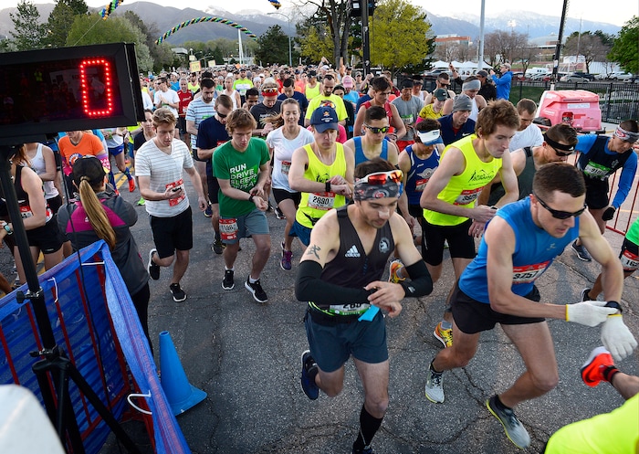 (Scott Sommerdorf | The Salt Lake Tribune)The first wave of runners leaves the starting line of the Salt Lake City marathon, Saturday, April 21, 2018.