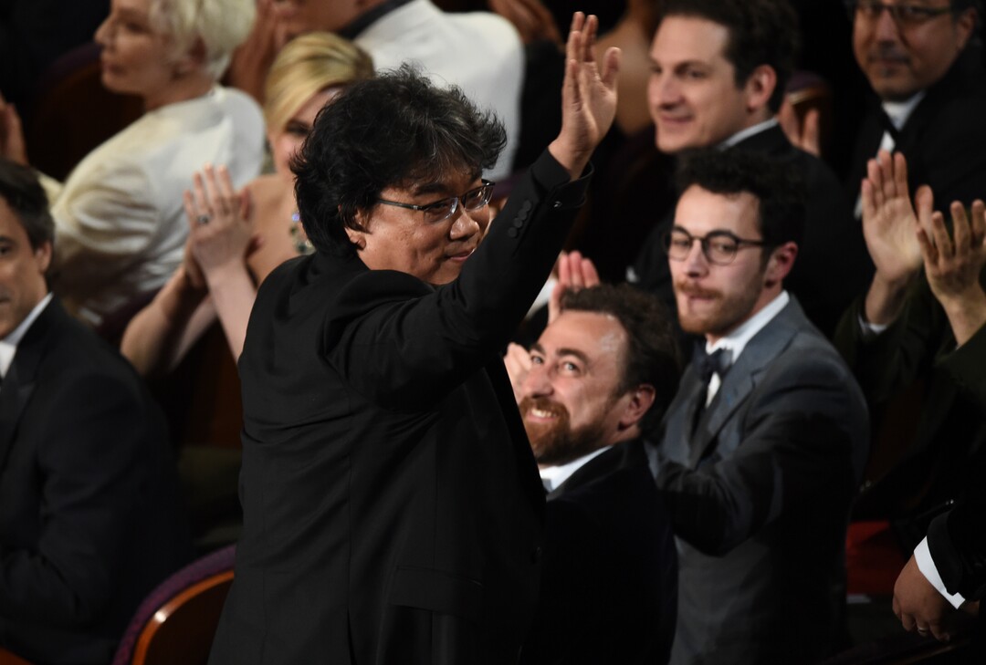 (Chris Pizzello | AP)  Bong Joon-ho was seen in the audience before accepting the award for best original screenplay for "Parasite" at the Oscars on Sunday, Feb. 9, 2020, at the Dolby Theatre in Los Angeles.