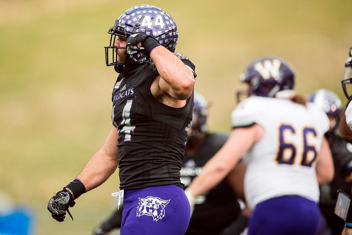 (Chris Detrick  |  The Salt Lake Tribune)  Weber State Wildcats defensive lineman Cardon Malan (44) celebrates after sacking Western Illinois Leathernecks quarterback Sean McGuire (18) during the game at Stewart Stadium Saturday, November 25, 2017.  