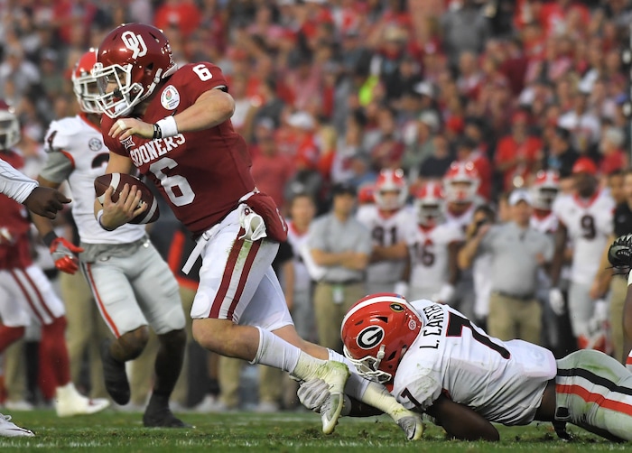 Oklahoma quarterback Baker Mayfield (6) is sacked by Georgia linebacker Lorenzo Carter, right, during the second half of the Rose Bowl NCAA college football game, Monday, Jan. 1, 2018, in Pasadena, Calif. (AP Photo/Mark J. Terrill)