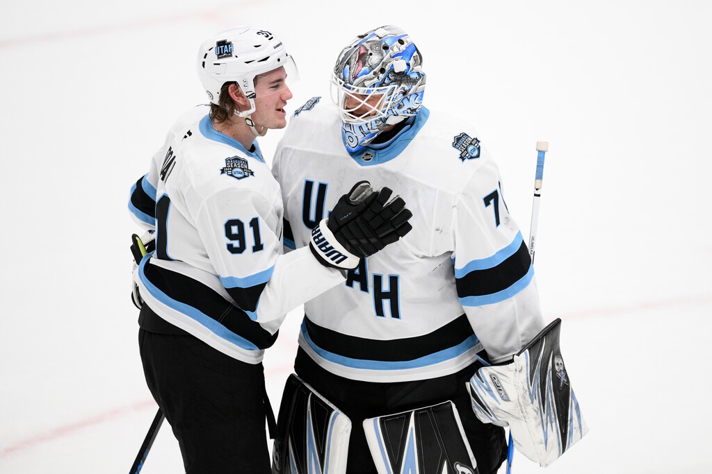 (Nick Wass | AP) Utah Hockey Club right wing Josh Doan (91) and goaltender Karel Vejmelka, right, celebrate after an NHL hockey game against the Washington Capitals, Sunday, Feb. 9, 2025, in Washington.