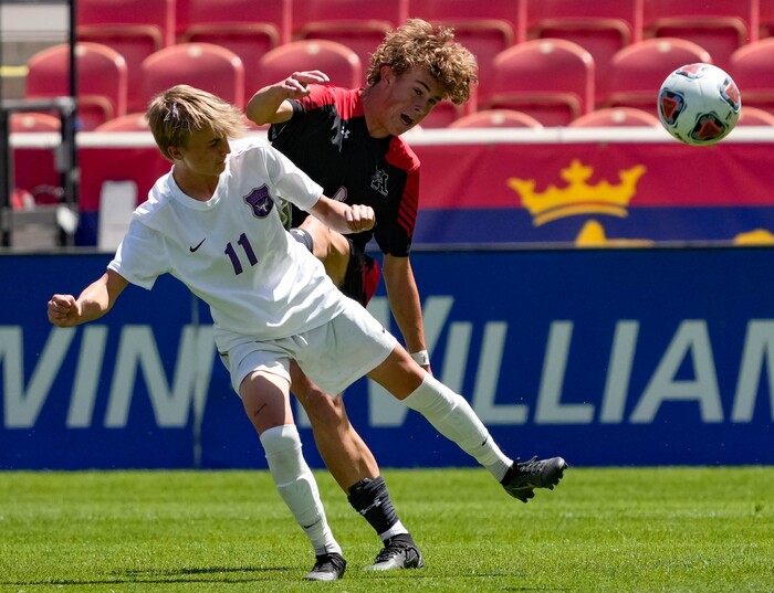 (Francisco Kjolseth | The Salt Lake Tribune) Lehi’s Colton Marsing (11) battles Alta’s Brock Bennion (6) for possession during their 5A State Soccer Championship title game at Rio Tinto Stadium, Wednesday, May 25, 2022. Alta defeated Lehi in shootout 3-1.