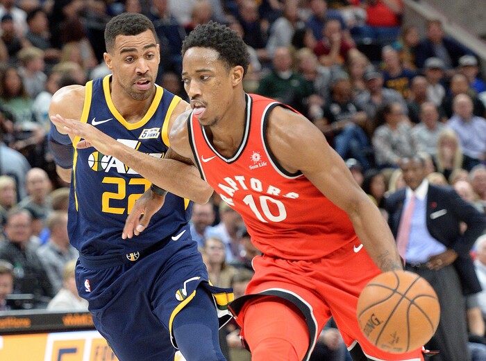 (Leah Hogsten  |  The Salt Lake Tribune)  Toronto Raptors guard DeMar DeRozan (10) draws the foul on Utah Jazz forward Thabo Sefolosha (22). The Utah Jazz were defeated by the Toronto Raptors 100-109 at Vivint Smart Home Arena, Friday, November 3, 2017