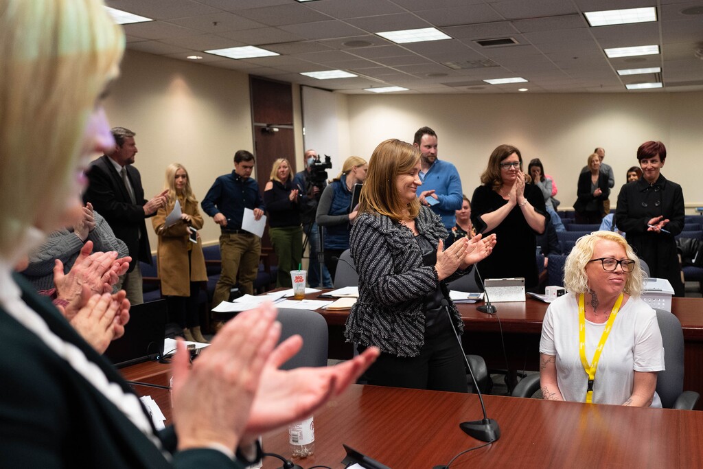 (Trent Nelson  |  The Salt Lake Tribune) Tiffani King is given a standing ovation during a Salt Lake County Council meeting after presenting information about NARCAN, the opioid antagonist drug, to the County Council in Salt Lake City on Tuesday, Feb. 11, 2020. At center left is Salt Lake County Mayor Jenny Wilson, who was present when King saved a life by delivering a dose of naloxone.