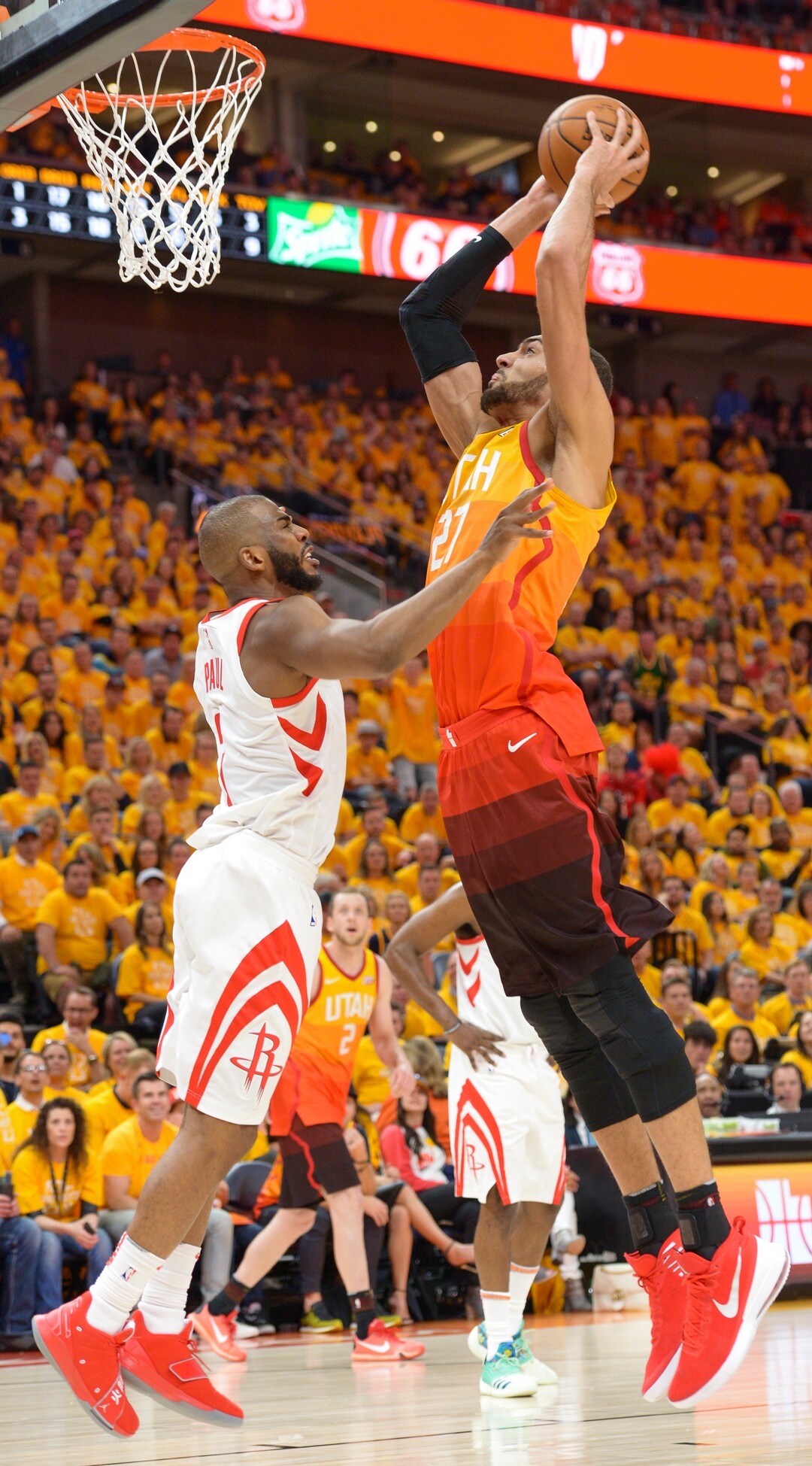 (Leah Hogsten  |  The Salt Lake Tribune)  Utah Jazz center Rudy Gobert (27) dunks on Houston Rockets guard Chris Paul (3)as the Utah Jazz take on the Houston Rockets in Game 3 of an NBA basketball second-round playoff series Friday, May 4, 2018 in Salt Lake City.
