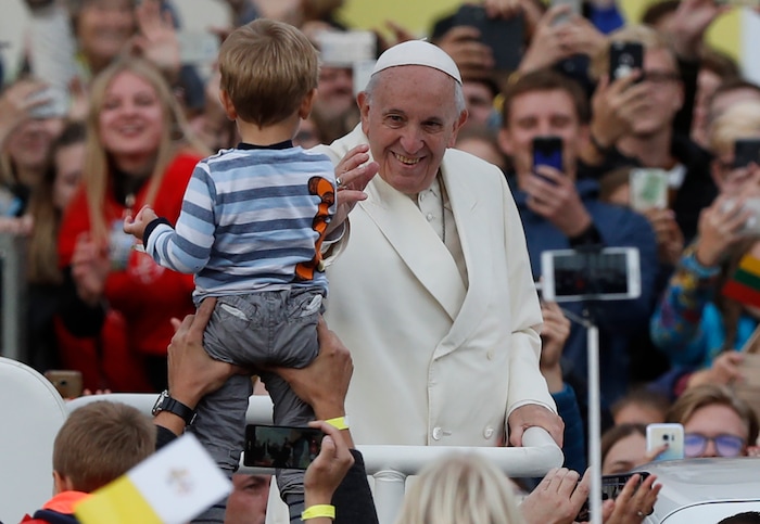 (Mindaugas Kulbis  |  AP Photo)  Pope Francis greets the crowd on his Popemobile as he arrives for a meeting with youths at the Cathedral Square in Vilnius, Lithuania, Saturday Sept. 22, 2018. Pope Francis begins a four-day visit to the Baltics amid renewed alarm about Moscow's intentions in the region it has twice occupied.