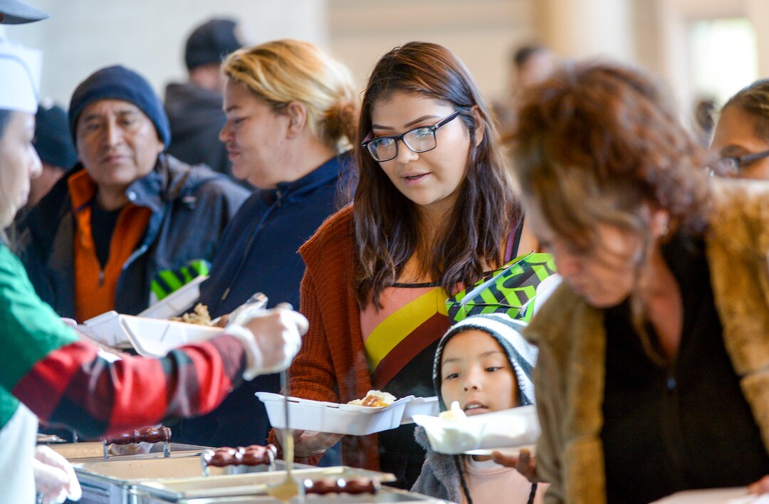 Leah Hogsten  |  The Salt Lake Tribune Local homeless and low-income families were given a hot Thanksgiving dinner, shoes and clothing at the Utah Jazz and the Larry H. Miller Group sponsored annual “We Care – We Share” benefit, Monday, Nov 19, 2018.