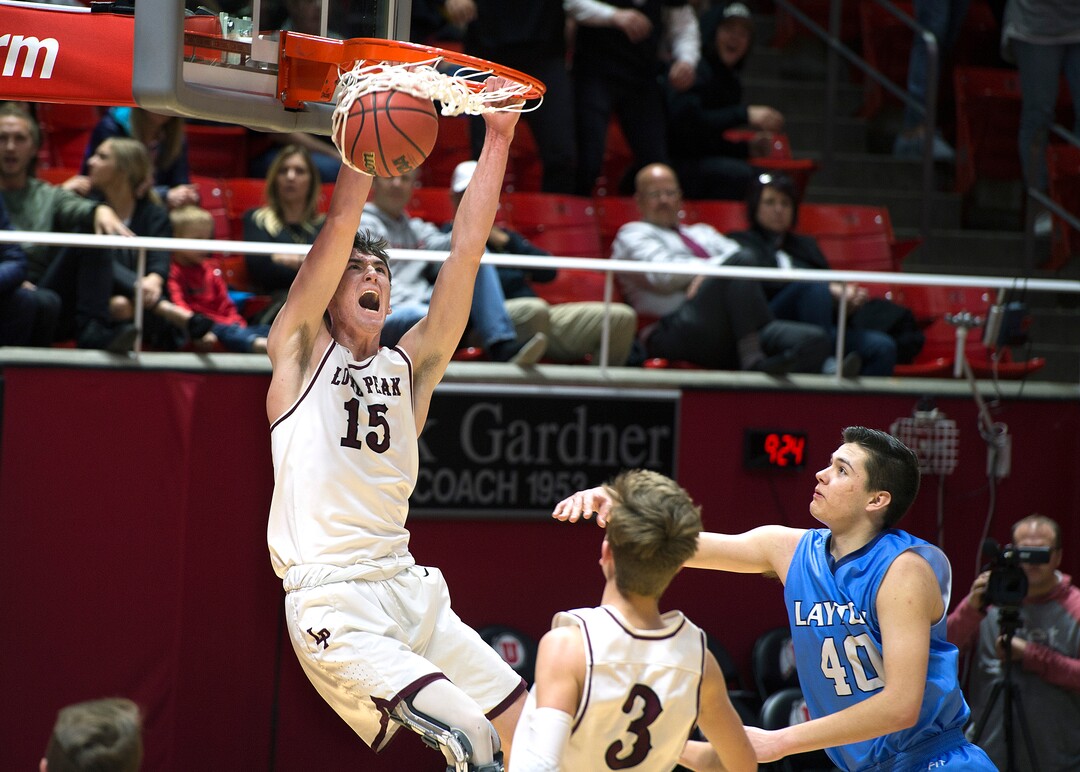 Scott Sommerdorf | The Salt Lake TribuneLone Peak's Jackson Pollard dunks late in the second half as Lone Peak beat Layton 82-47, in a boy's 6A semi-final, FrIday, March. 2, 2018.