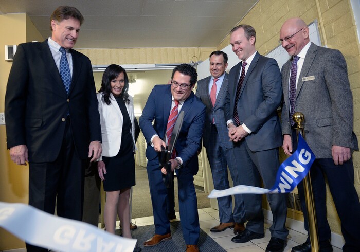 (Al Hartmann | The Salt Lake Tribune)
Rep. James Dunnigan, left, Odyssey House outreach specialist Rachel Santizo, Odyssey House CEO Adam Cohen, Speaker of the House Greg Hughes, Salt Lake County Mayor Ben McAdams and Milcreek Mayor Jeff Silvestrini cut the ribbon to open a new Odyssey House- an 88 bed treatment facility Thursday Jan. 11 at 3944 S. 400 E. in Millcreek.
