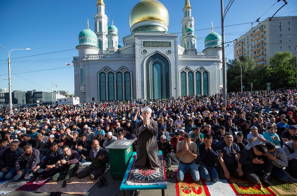 (AP Photo/Alexander Zemlianichenko) Muslims pray outside the Moscow Cathedral Mosque during celebrations of Eid al-Fitr holiday, a feast celebrated by Muslims worldwide, in Moscow, Russia, Tuesday, June 4, 2019. Eid al-Fitr marks the end of the Muslims' holy fasting month of Ramadan.