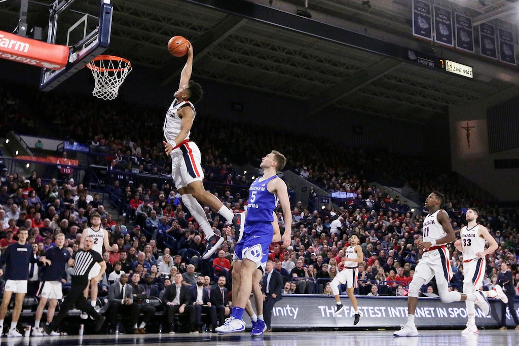 (Young Kwak | AP) Gonzaga guard Admon Gilder (1) goes up for a dunk in front of BYU guard Jake Toolson (5) during the second half of an NCAA college basketball game in Spokane, Wash., Saturday, Jan. 18, 2020. Gonzaga won 92-69.
