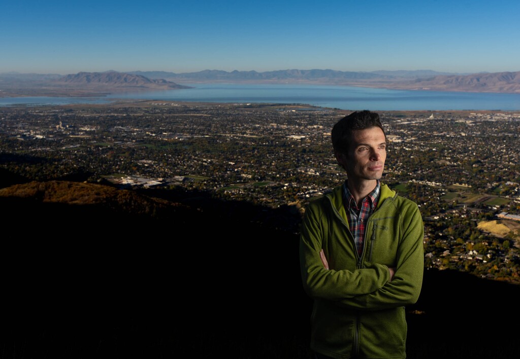 (Francisco Kjolseth | The Salt Lake Tribune) Ben Abbott, a BYU professor, poses for a portrait at a Utah Lake overlook on Wednesday, Oct. 18, 2023. It appears lawmakers and lobbyists retaliated against scientists who didn't support the Utah Lake dredging and islands project and Abbott had state funding cut for a watershed research project.
