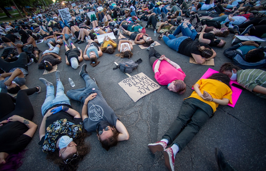(Rick Egan  |  The Salt Lake Tribune) Protesters lie down for 8 minutes during a demonstration in Salt Lake City, Thursday, June 4, 2020.