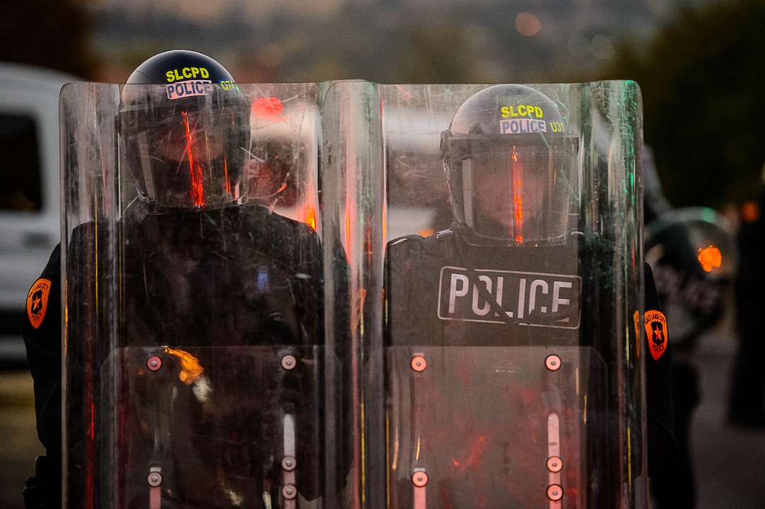 (Trent Nelson  |  The Salt Lake Tribune) Police form a line as protesters march near Kingsbury Hall in Salt Lake City on Wednesday, Oct. 7, 2020.