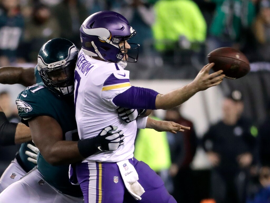 (AP Photo/Michael Perez) Philadelphia Eagles' Fletcher Cox hits Minnesota Vikings' Case Keenum as he throws during the second half of the NFL football NFC championship game Sunday, Jan. 21, 2018, in Philadelphia.