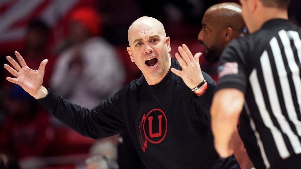 (Rick Bowmer | AP) Utah head coach Craig Smith, left, argues with a referee during the second half of an NCAA college basketball game against Stanford, Thursday, Feb. 2, 2023, in Salt Lake City.