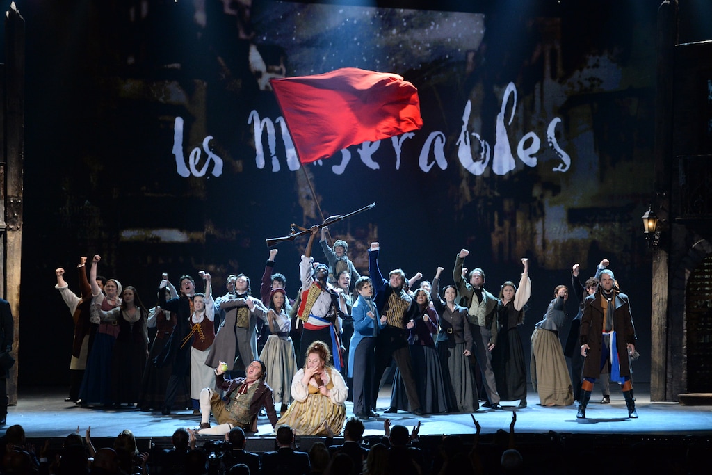 (Evan Agostini | Invision/AP) The cast of "Les Miserables" performs onstage at the 68th annual Tony Awards at Radio City Music Hall on Sunday, June 8, 2014, in New York. 