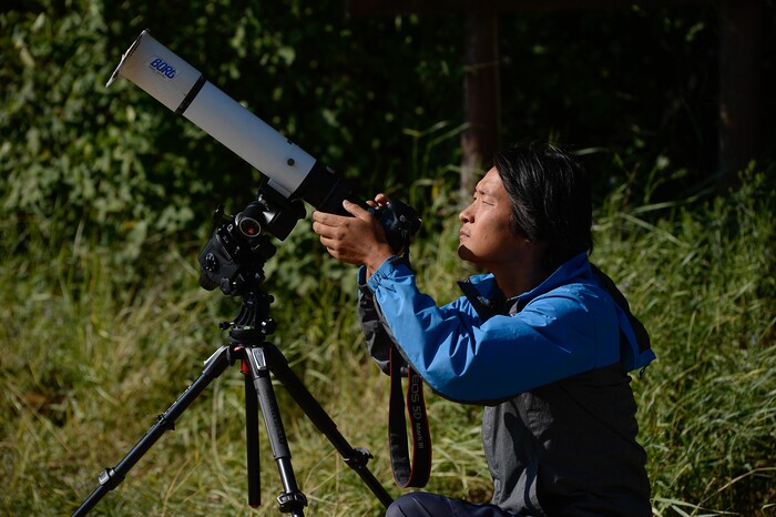 (Francisco Kjolseth  |  The Salt Lake Tribune)  Jin Young Yoon of South Korea readies his equipment to capture the total eclipse of the sun from the edge of Palisades Reservoir, Idaho, on Monday, August 21, 2017.