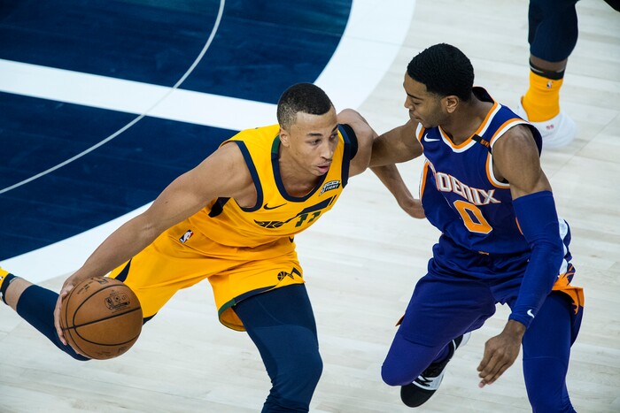 (Chris Detrick  |  The Salt Lake Tribune)  Utah Jazz guard Dante Exum (11) and Phoenix Suns guard Shaquille Harrison (10) during the game at Vivint Smart Home Arena Thursday, March 15, 2018. 