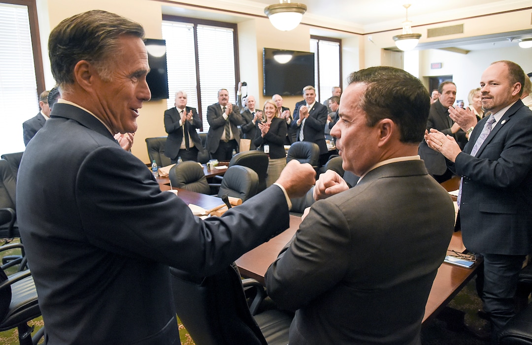 (Francisco Kjolseth  |  The Salt Lake Tribune)  Sen. Mitt Romney speaks with Speaker of the House Brad Wilson, R-Kaysville, during a series of meetings with state lawmakers at the Utah Capitol on Thursday, Feb. 21, 2019.