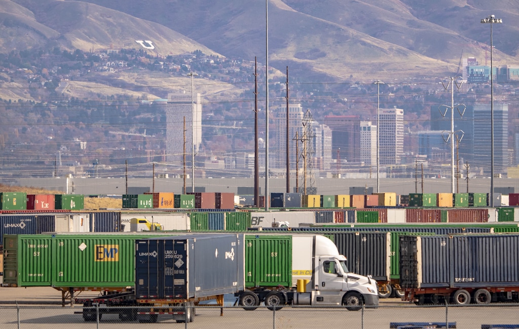(Francisco Kjolseth | The Salt Lake Tribune) Trucks carrying shipping containers move in and out of the Union Pacific intermodal terminal at a steady pace, west of Salt Lake City. It's part of the jurisdictional area state lawmakers deemed part of an inland port, seen on Wednesday, Nov. 10, 2021.