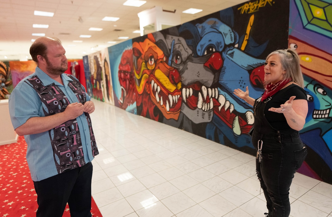 (Francisco Kjolseth | The Salt Lake Tribune) Derek Dyer, Executive Director at Utah Arts Alliance and Suzanne Raia, Asst. Manager and artist at Dreamscapes, now in the old Macy's at South Town, talk about the upcoming opening of the immersive and transformational experience that is Dreamscapes on Wednesday, April 20, 2022. 