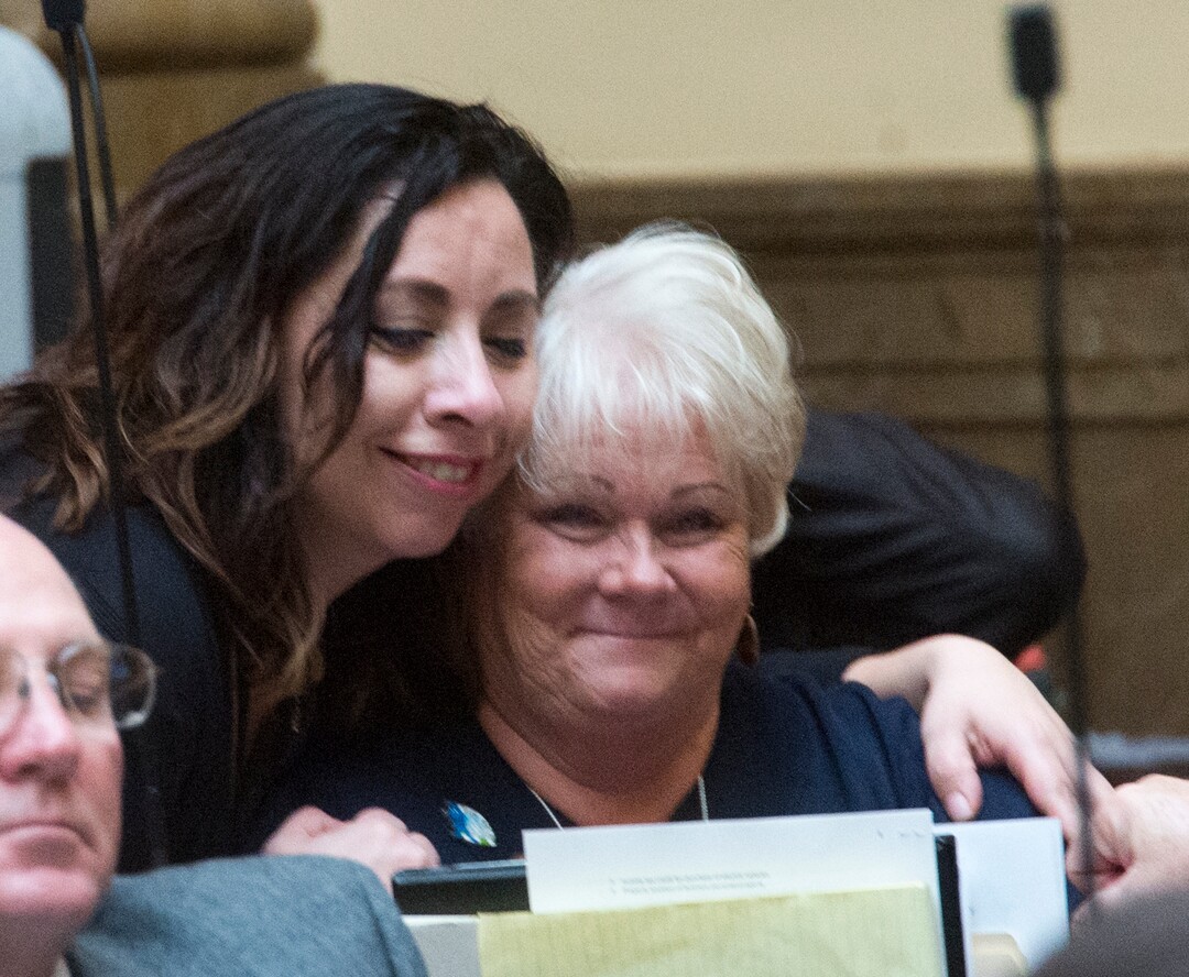 (Rick Egan  |  The Salt Lake Tribune)    Rep. Angela Romero comforts Rep. Susan Duckworth after her discussion on HB 41, which has become known as "Hannah's Bill" on the floor of the House of Representatives, Friday, January 26, 2018.