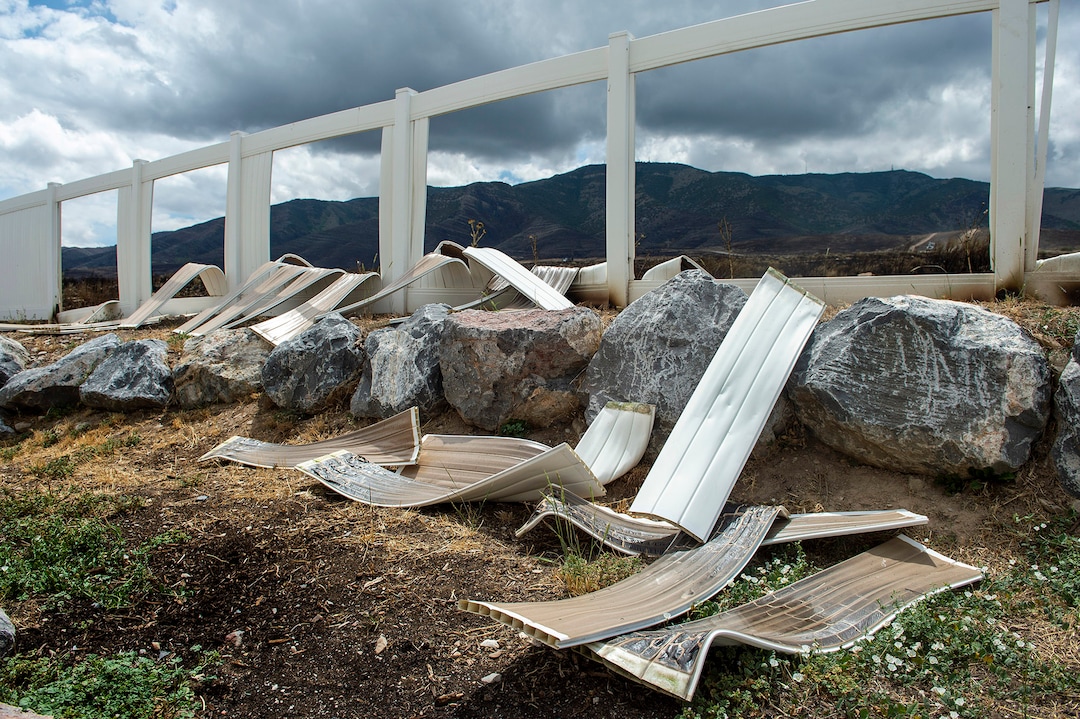 (Rick Egan  |  The Salt Lake Tribune)      The Knolls fire melted fences and did some property damage, but spared the homes on Sunrise Drive in Sunday's fire, in Saratoga Springs, Monday, June 29, 2020.