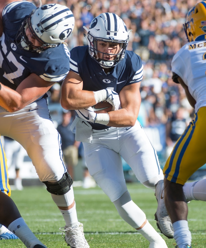 (Rick Egan  |  The Salt Lake Tribune)    Brigham Young Cougars running back Lopini Katoa (4) scores his first of two second quarter touchdowns, in football action Brigham Young Cougars vs McNeese State Cowboys at Lavell Edwards Stadium, Saturday, Sept. 22, 2018.


