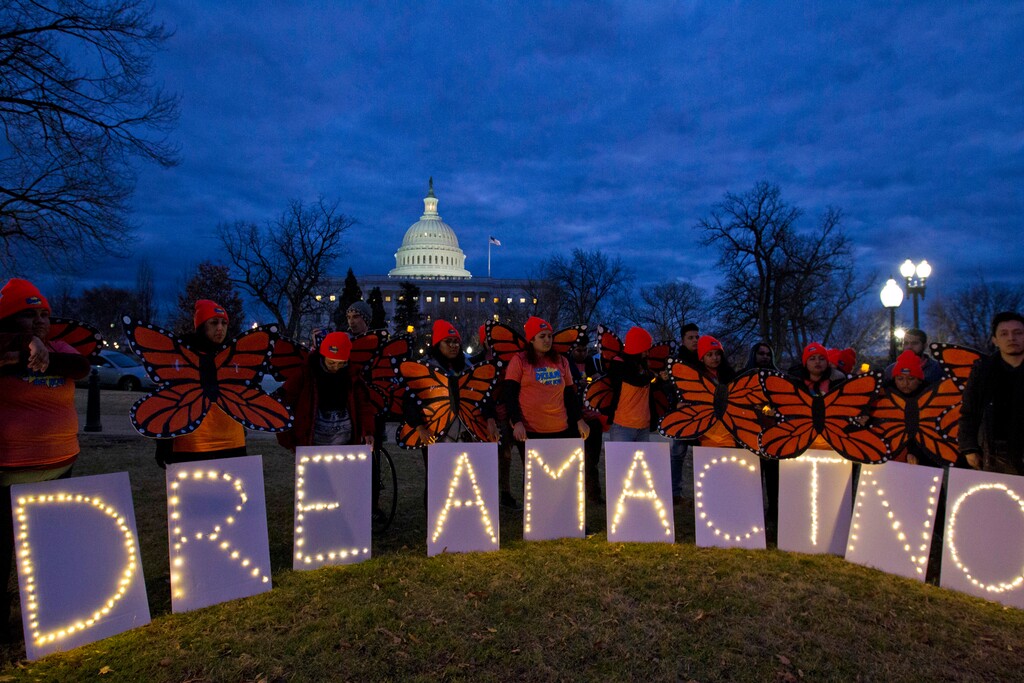 (AP Photo/Jose Luis Magana, File) In this Jan. 21, 2018, file photo, demonstrators rally in support of Deferred Action for Childhood Arrivals (DACA) outside the Capitol Washington. An effort to protect young Dreamer immigrants from deportation never really had much chance of squeezing into the last bill Congress must pass this election year. That’s why bargainers from both parties were surprised when the White House tried anyway.