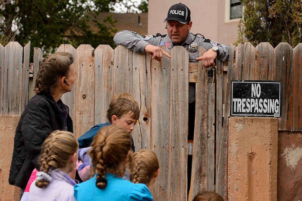 Trent Nelson  |  The Salt Lake TribuneColorado City Town Marshal Sam Johnson tells an FLDS woman who had been evicted from her Colorado City, AZ, home, that she will be allowed to retrieve her belongings from the yard, Wednesday May 10, 2017.